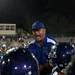 The Pioneer football team lifts assistant coach Tom Barbieri in celebration after defeating Dexter High School 69-0 on Friday. Barbieri was Head Coach of Dexter Football for ten years. Daniel Brenner I AnnArbor.com